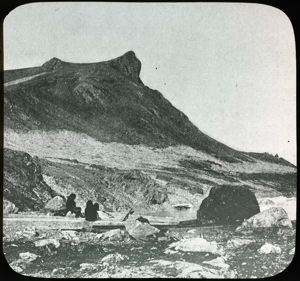 Image of Eskimos [Inuit] Seated, Boulder, Big Cape